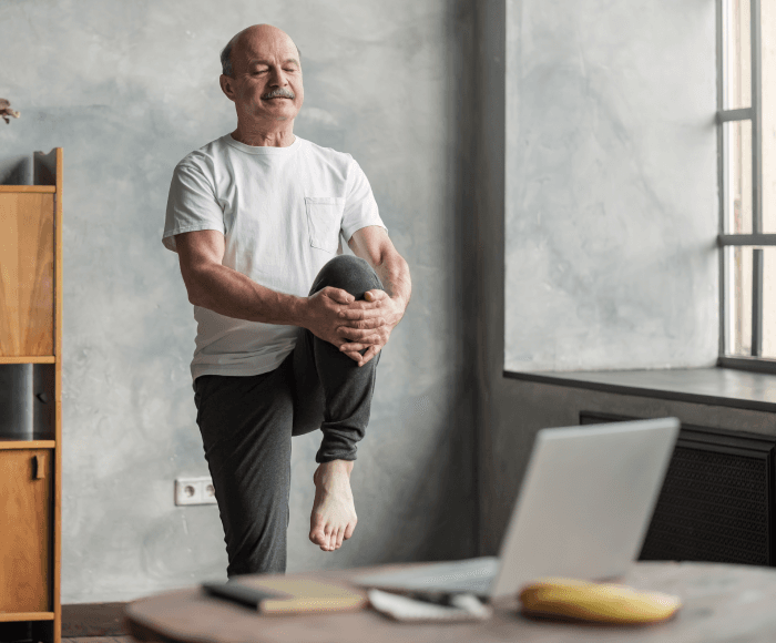 Senior stretching during physiotherapy