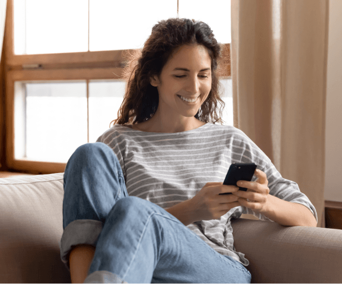 Woman answering questions on her phone