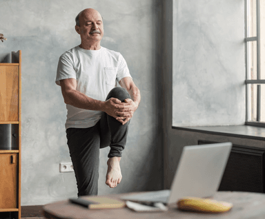 Senior stretching during physiotherapy