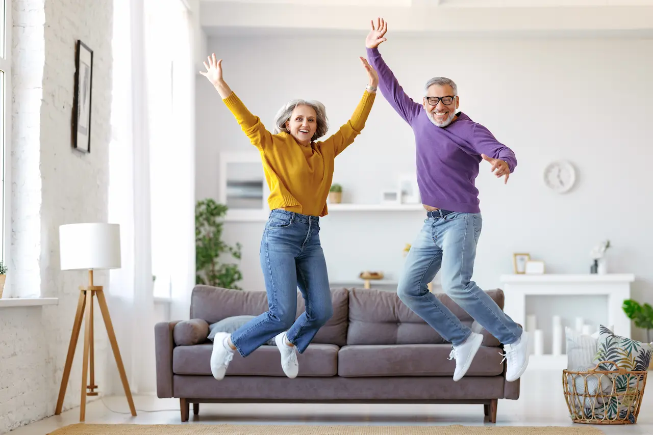 Senior couple jumping